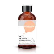 Load image into Gallery viewer, Product image of 250ml bottle of human grade pet shampoo with 100% Australian hemp seed oil in cherry zest scent